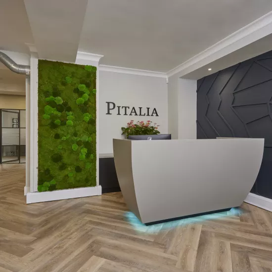 HIMACS creates a striking and sculptural reception desk at Pitalia’s new Manchester office