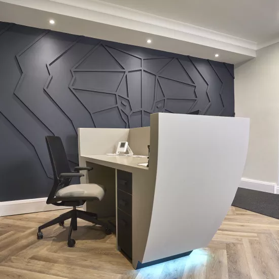 HIMACS creates a striking and sculptural reception desk at Pitalia’s new Manchester office