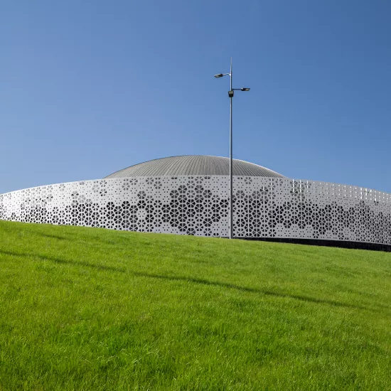 Urania Sports & Entertainment Centre in Olsztyn Showcases Unique HIMACS Facade