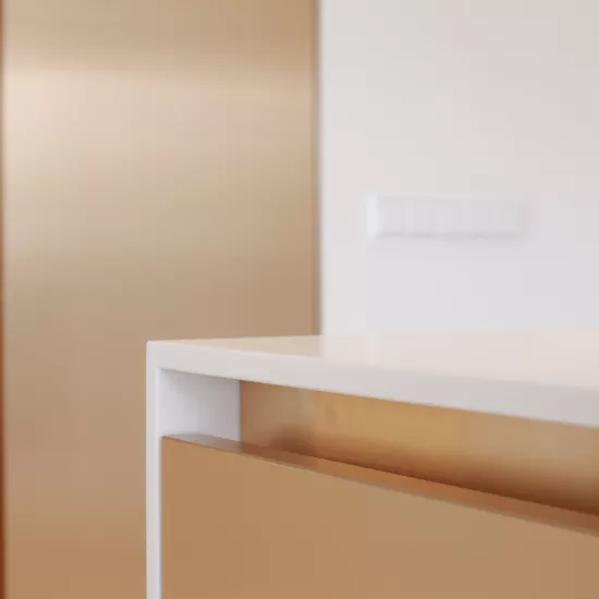 Contrasting finishes: HIMACS and copper shine brightly in this kitchen